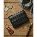 Czarne etui na klucze ze skóry naturalnej zamykane suwakami