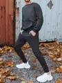 Tepláková tmavo-sivá pánska súprava skl.8