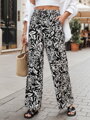 Dámske nohavice materiálové s voľne splývavým strihom TROPICAL SUN čierne UY2634