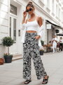 Dámske nohavice materiálové s voľne splývavým strihom TROPICAL SUN čierne UY2634