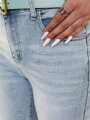 Dámske rifľové nohavice skinny so srdiečkami JENIVIA modré UY2482