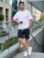 Pánske tmavomodré teplákové kraťasy Dstreet SX2626