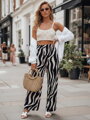 Dámske nohavice s voľne splývavým strihom pásikavé ZEBRAVIBE béžovo-čierne UY2653