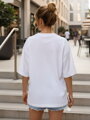 Dámske bavlnené oversize tričko s výrazným nápisom biele – Dstreet NX9003RY