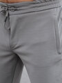 Pánske svetlošedé joggery Dstreet UX4267