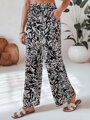 Dámske nohavice materiálové s voľne splývavým strihom TROPICAL SUN čierne UY2634