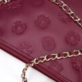 Dámska trojkomorová kožená crossbody kabelka Wittchen s monogramovým vzorom 95-4E-633-3
