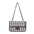 Dámska zapletaná crossbody kabelka Wittchen s retiazkou, čierno-biela 98-4Y-010-10