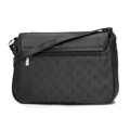 Crossbody z kože a žakáru s monogramom čierna  